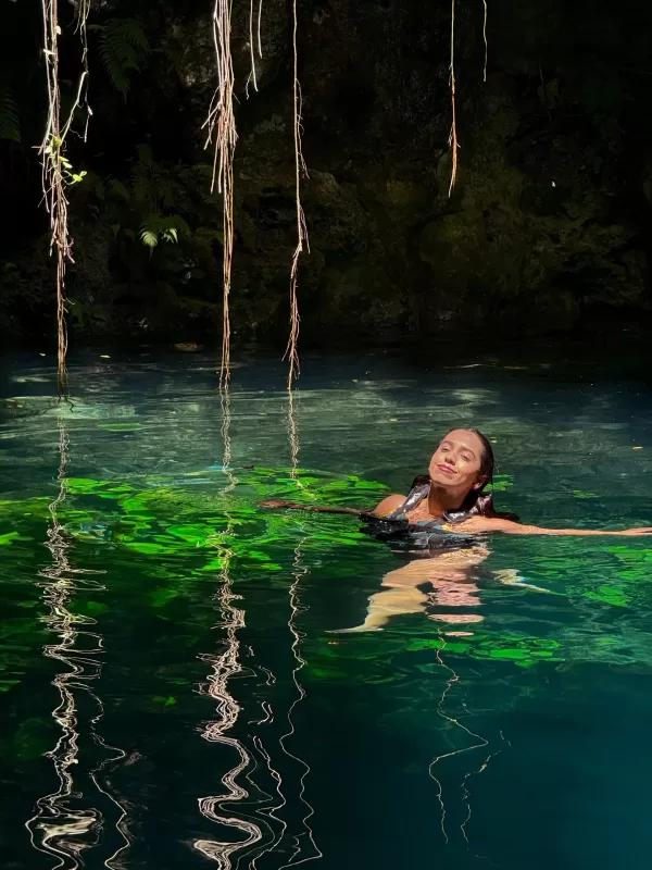ATV rider exploring Cancun jungle and cenotes.