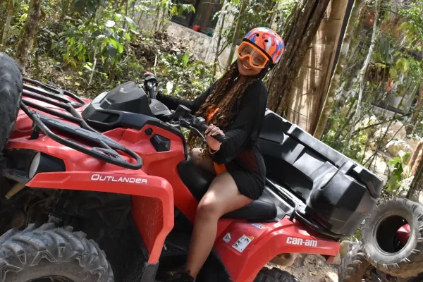 Woman preparing for an ATV ride through the Cancun jungle