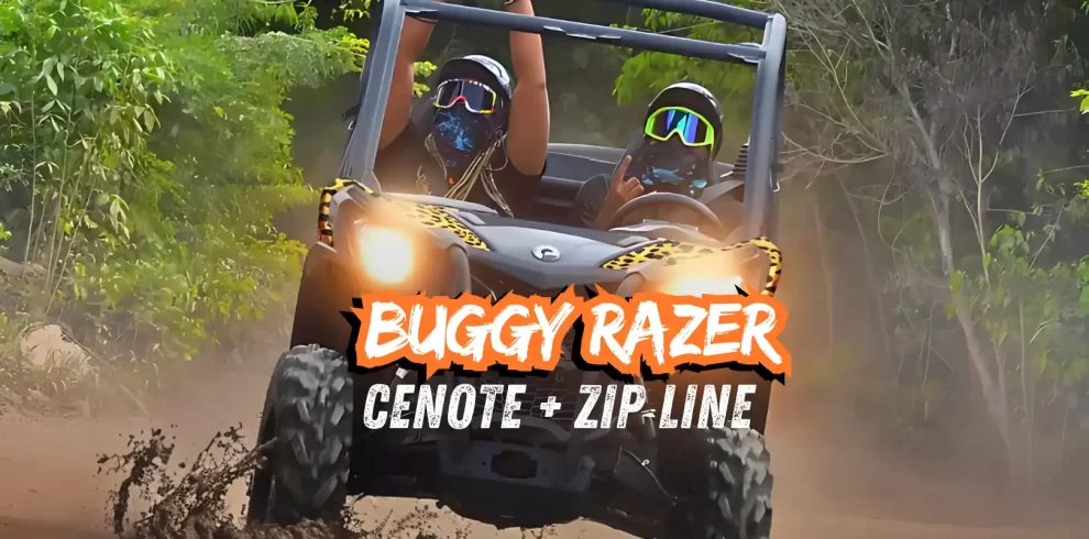 Two people driving a buggy on a dirt trail in the jungle, wearing goggles and face coverings.